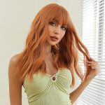 22-inch Medium Length Wavy Wig With Bangs - Orange Synthetic Highlight Wig for a Stylish Party Look